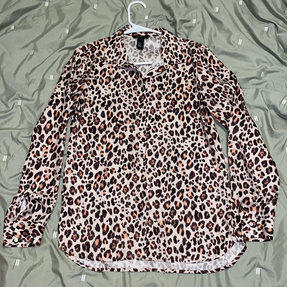 Woman’s H&M button down leopard print blouse